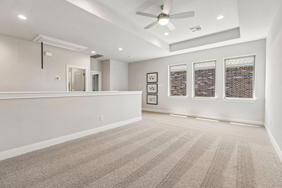 Representative unfurnished interior of a home built from the Hamilton by Risewell Homes in 6 Creeks, Kyle (Image 15).