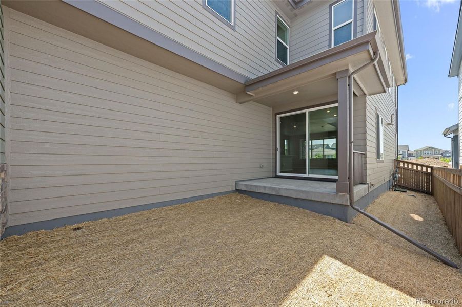 Front exterior of a new home in Painted Prairie, Aurora, CO, highlighting curb appeal (Image 28).
