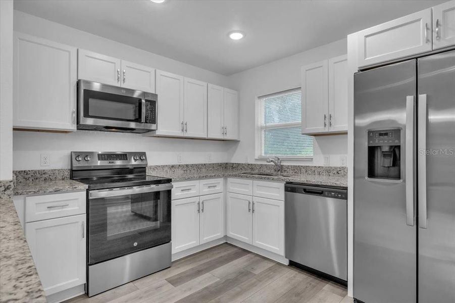 Furnished interior view inside a new home in , Punta Gorda (Image 8).