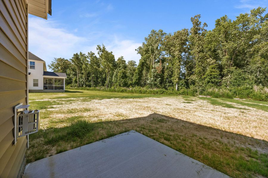 Front exterior of a new home in Laurel Oaks, Greenville, NC, highlighting curb appeal (Image 33). Front exterior of a new home in Laurel Oaks, Greenville, NC, highlighting curb appeal (Image 33).