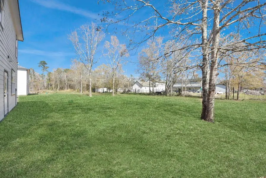 Exterior details and patio area of a home in , Conroe (Image 4). Exterior details and patio area of a home in , Conroe (Image 4).