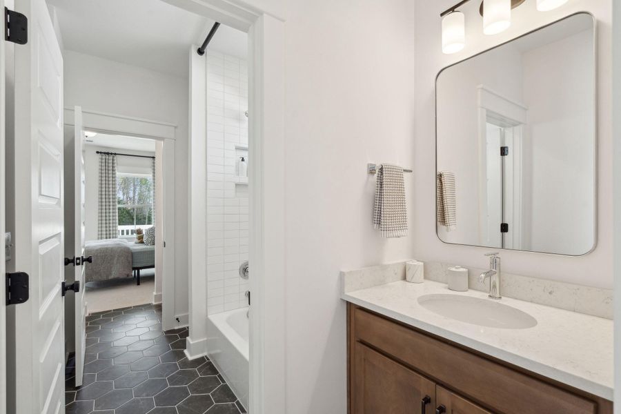 Furnished interior view inside a new home in Tidewater at Lakes of Cane Bay, Summerville (Image 45).