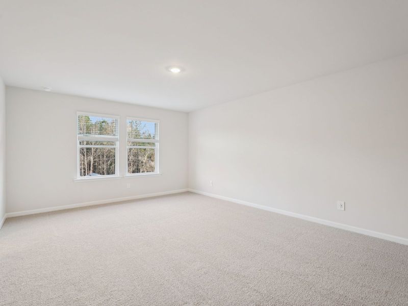 Spacious, unfurnished interior of a new home in Vines at Mill Creek - Estate Series, Braselton (Image 17).