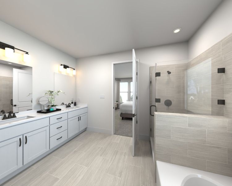 The primary bathroom offers dual vanity sinks and a walk-in shower. The primary bathroom offers dual vanity sinks and a walk-in shower.