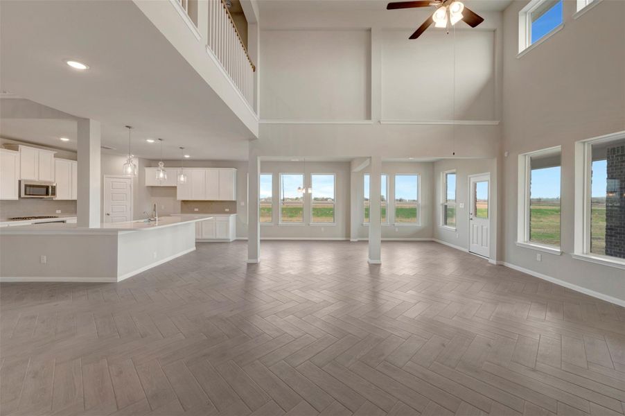 Tons of natural light in the great room, dining area, and sunroom