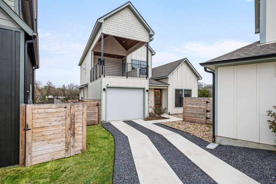 Front exterior of a new home in , Austin, TX, highlighting curb appeal (Image 1). Front exterior of a new home in , Austin, TX, highlighting curb appeal (Image 1).