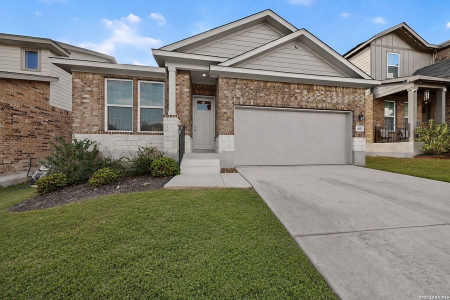 Front exterior of a new home in Bricewood, San Antonio, TX, highlighting curb appeal (Image 22).