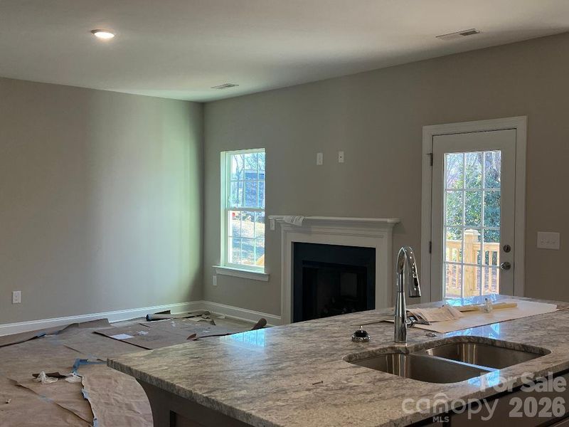 Large Kitchen Island overlooking Family Room