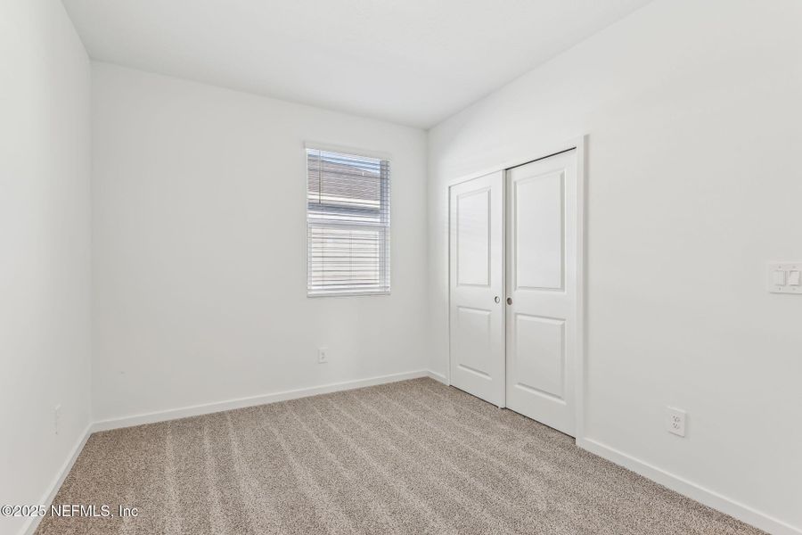 Spacious, unfurnished interior of a new home in Lakes at Bella Lago - Signature Series, Green Cove Springs (Image 14). Spacious, unfurnished interior of a new home in Lakes at Bella Lago - Signature Series, Green Cove Springs (Image 14).