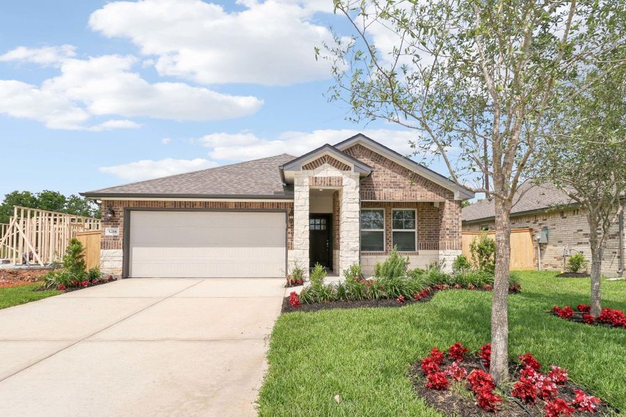 Front exterior of a new home in Massey Oaks - Premier Series, Pearland, TX, highlighting curb appeal (Image 24).