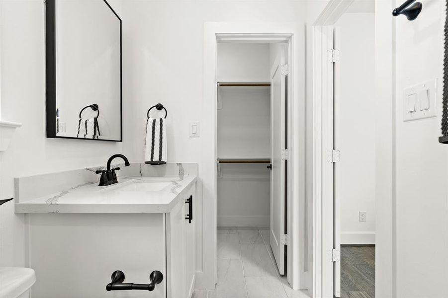 This secondary bathroom also comes with a walk in closet as your secondary.