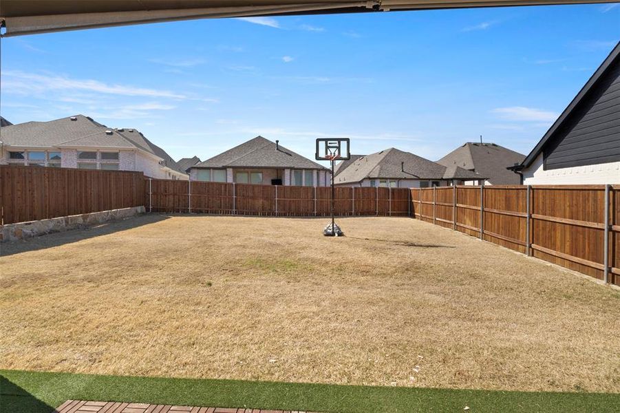 Exterior details and patio area of a home in , Aubrey (Image 20). Exterior details and patio area of a home in , Aubrey (Image 20).