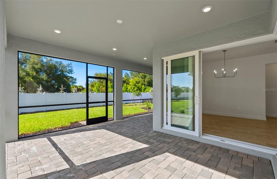 Exterior details and patio area of a home in Shores at Stillwater, Englewood (Image 3).