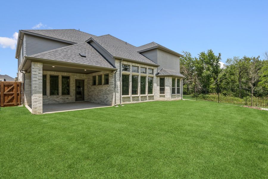 Covered Patio in the Mercury home plan by Trophy Signature Homes – REPRESENTATIVE PHOTO Covered Patio in the Mercury home plan by Trophy Signature Homes – REPRESENTATIVE PHOTO