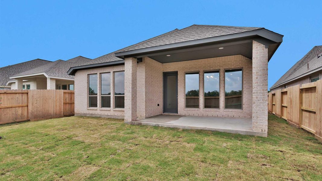 Exterior details and patio area of a home in Valencia, Manvel (Image 2). Exterior details and patio area of a home in Valencia, Manvel (Image 2).