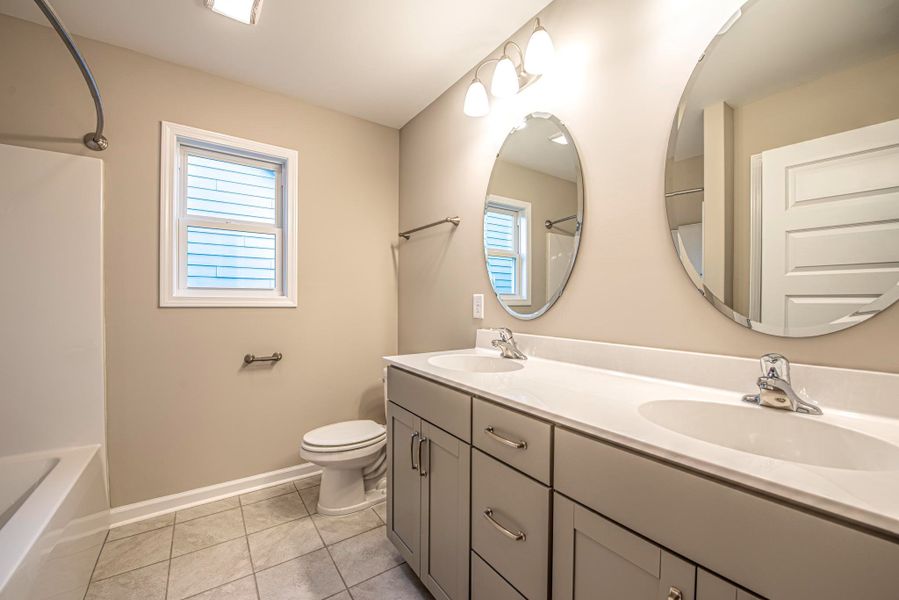Representative furnished interior of a home built from the Bayhill A by JC Jackson Homes,LLC in Heritage Pointe, Newport (Image 12).
