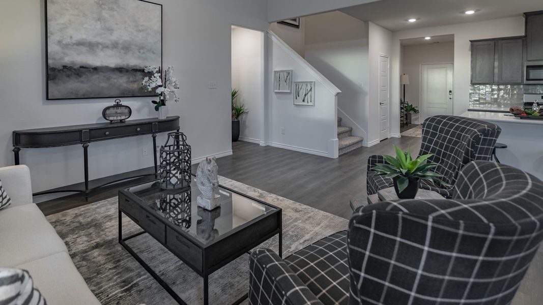 Representative furnished interior of a home built from the Copaiba by D.R. Horton in Windchime, Celina (Image 7).