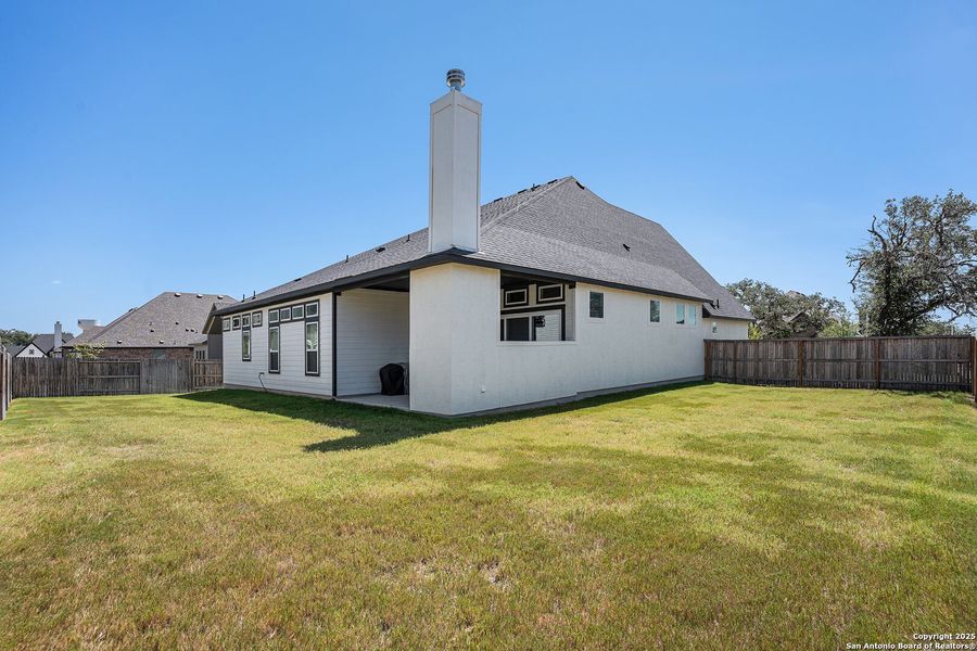 Front exterior of a new home in Mesa Western, Cibolo, TX, highlighting curb appeal (Image 19).