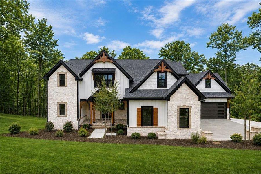 Front exterior of a new home in , Gainesville, GA, highlighting curb appeal (Image 1). Front exterior of a new home in , Gainesville, GA, highlighting curb appeal (Image 1).