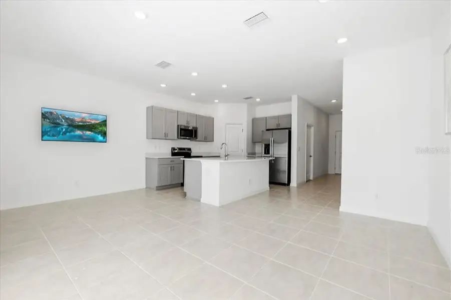 Furnished interior in a model home at The Townhomes at Azario Lakewood Ranch in Bradenton (Image 5).