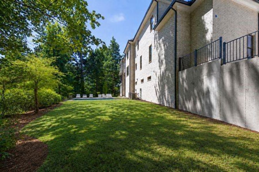 Exterior details and patio area of a home in , Acworth (Image 31).