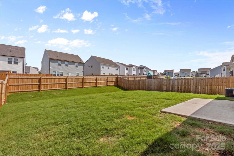 Front exterior of a new home in , Troutman, NC, highlighting curb appeal (Image 22).