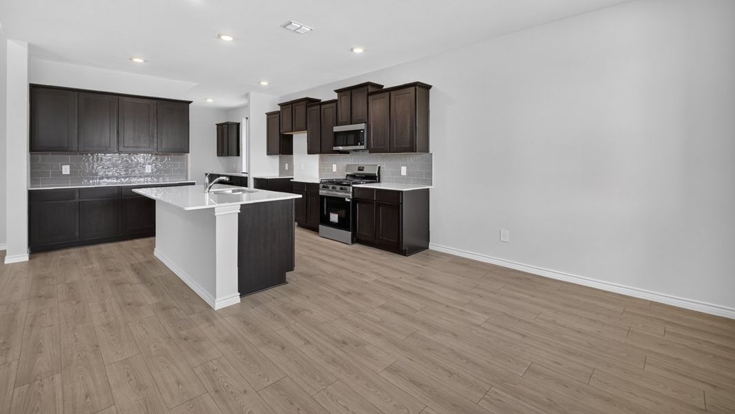 Representative furnished interior of a home built from the Owens by D.R. Horton in Lilybrooke at Legacy Hills, Celina (Image 5).
