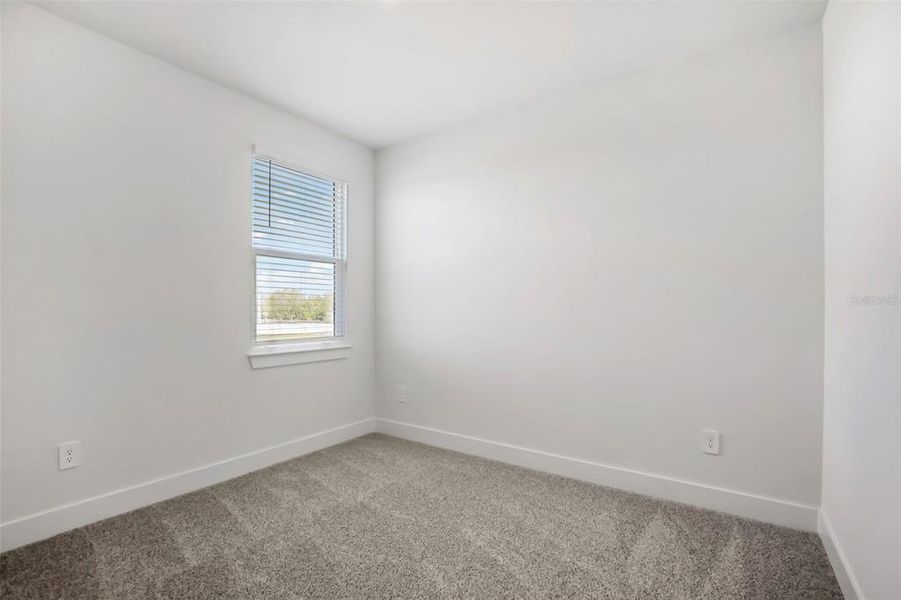 Spacious, unfurnished interior of a new home in Magnolia Bay - Reserve Series, Nokomis (Image 29).