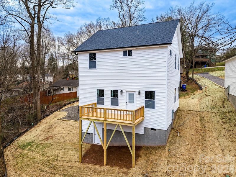 Exterior details and patio area of a home in , Asheville (Image 25).