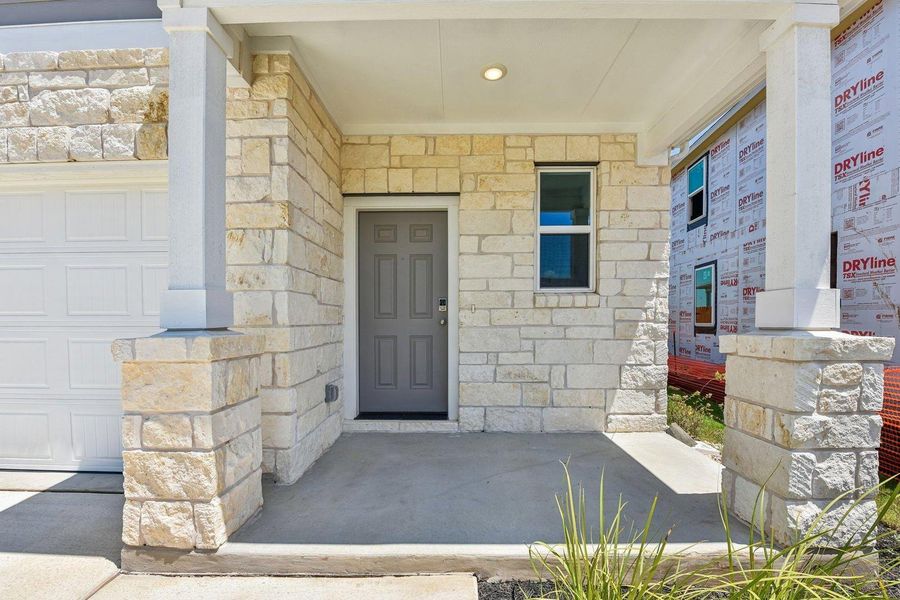 Exterior details and patio area of a home in Trinity Ranch, Elgin (Image 24).
