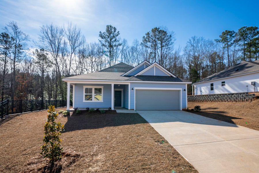 Front exterior of a new home in Carriage Estates, Lexington, SC, highlighting curb appeal (Image 1). Front exterior of a new home in Carriage Estates, Lexington, SC, highlighting curb appeal (Image 1).