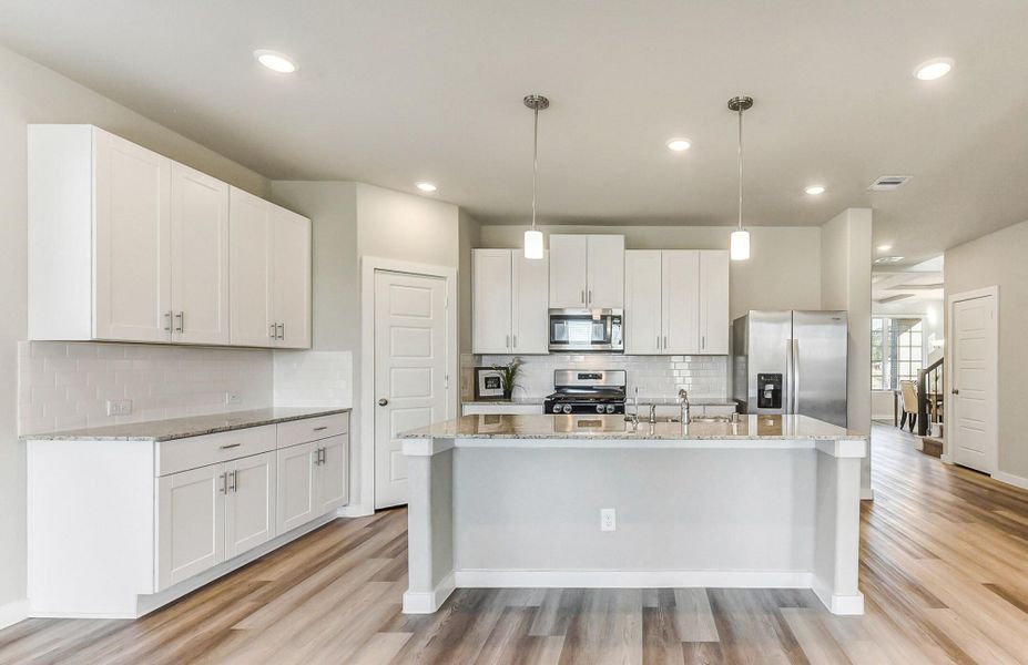 Furnished interior view inside a new home in Sundance Cove - Premier Series, Crosby (Image 7).