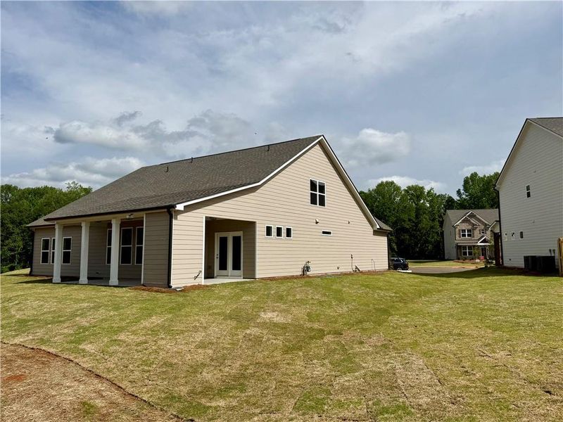 Exterior details and patio area of a home in Ponderosa Farms Reserve, Gainesville (Image 3).