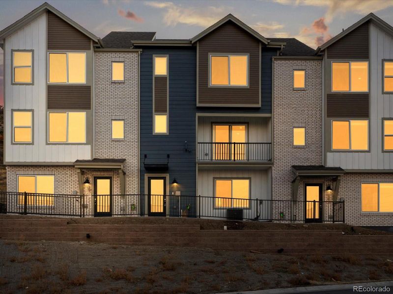 Front exterior of a new home in Three Hills, Morrison, CO, highlighting curb appeal (Image 1).