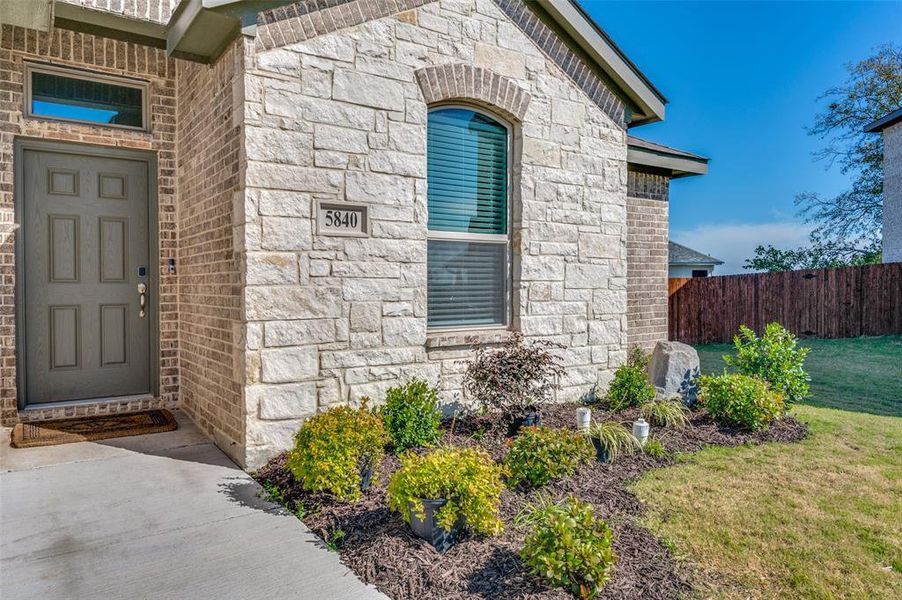 Front exterior of a home in the Brookville Ranch community, located in Fort Worth, TX (Image 10).