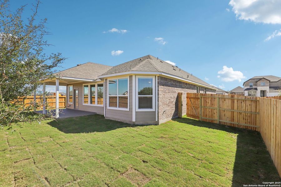 Exterior details and patio area of a home in Carmel Ranch, Schertz (Image 23).