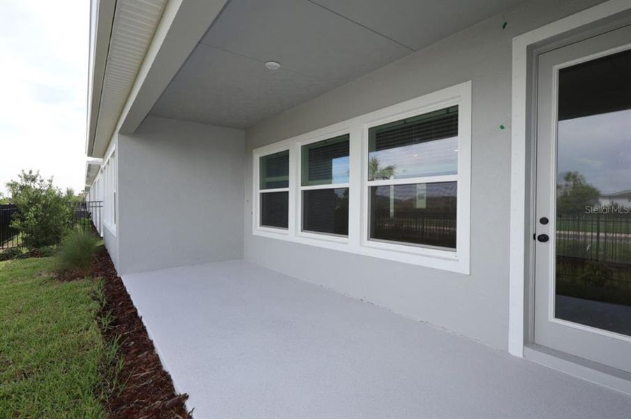 Exterior details and patio area of a home in Waterset Bungalow Series, Apollo Beach (Image 3).