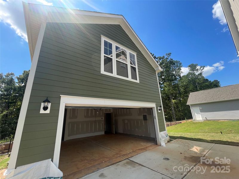 Front exterior of a new home in Arbor Village, Matthews, NC, highlighting curb appeal (Image 2). Front exterior of a new home in Arbor Village, Matthews, NC, highlighting curb appeal (Image 2).
