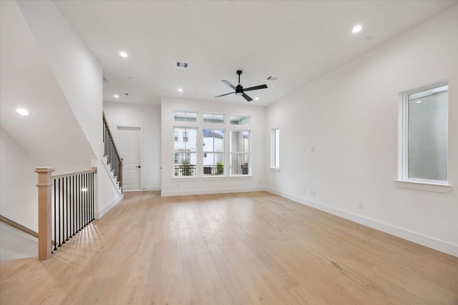 From this angle, the open-concept design highlights the home’s airy feel and cohesive living spaces ideal for modern living.