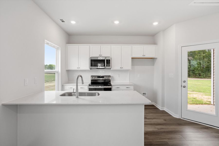 Furnished interior view inside a new home in Cambridge Reserve, Angier (Image 7).