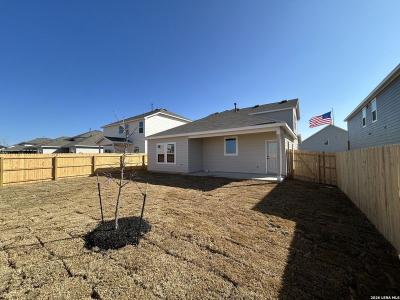 Exterior details and patio area of a home in Hennersby Hollow, San Antonio (Image 21).