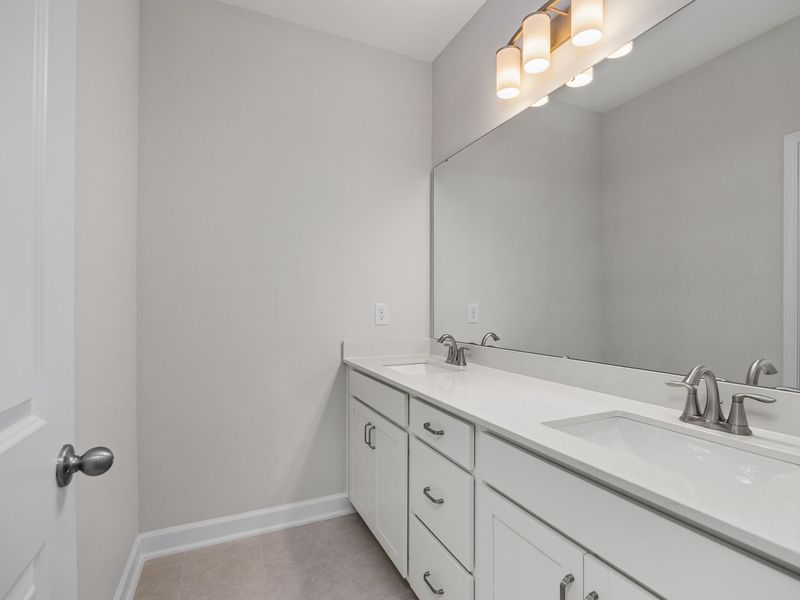 Image 33 representing the The Aspen by Davidson Homes LLC in Sage on North Main, Wake Forest, NC.