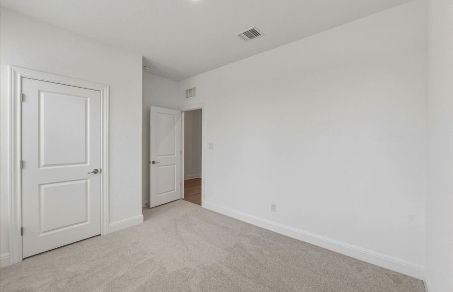 Spacious, unfurnished interior of a new home in Saddleback at Santa Rita Ranch, Liberty Hill (Image 32).