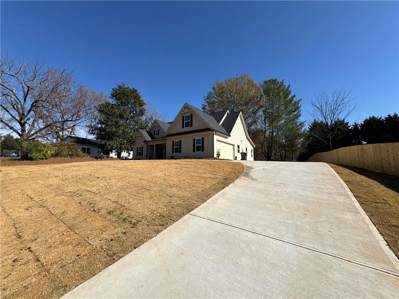 Exterior details and patio area of a home in , Ball Ground (Image 3).
