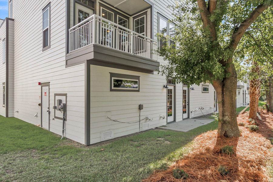Exterior details and patio area of a home in , North Charleston (Image 46).