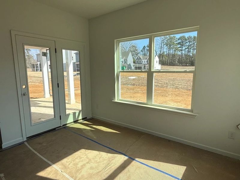 Breakfast Area featuring the AW Collection® Rosemary - Sunlit comfort with warm natural tones.