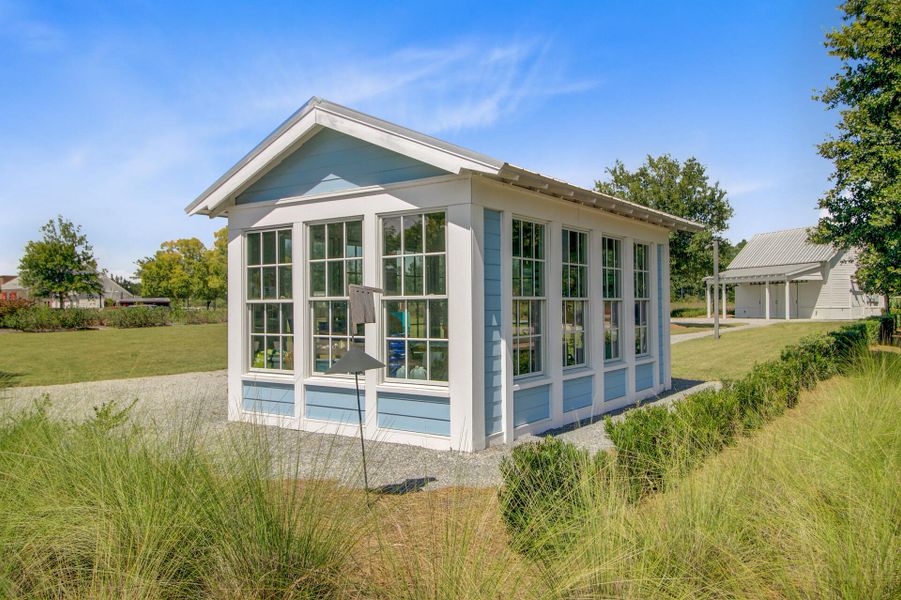 Exterior details and patio area of a home in Sweetgrass at Summers Corner, Summerville (Image 28).