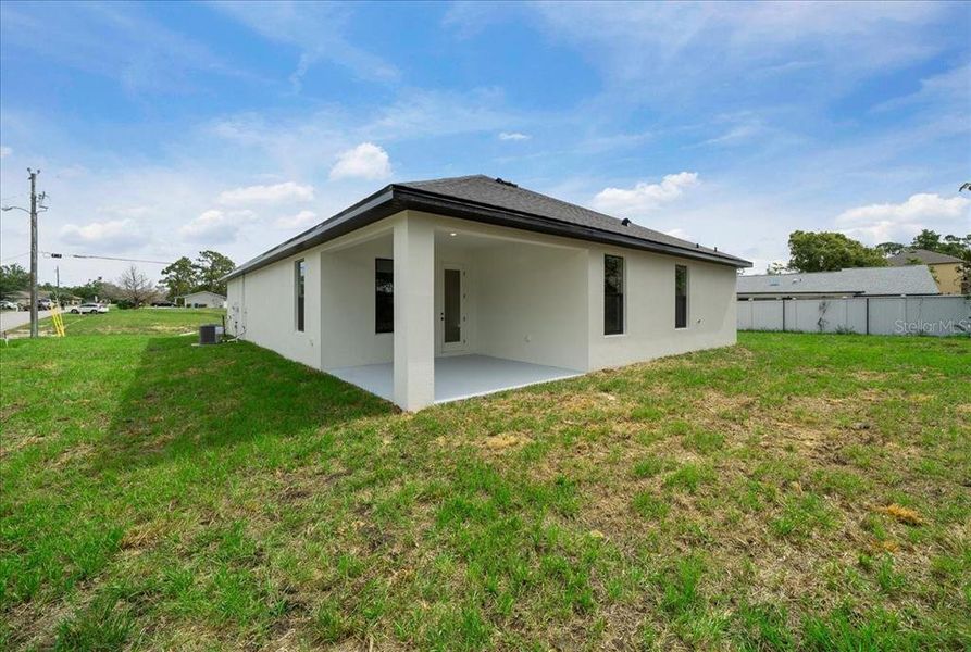 Exterior details and patio area of a home in , Spring Hill (Image 34).