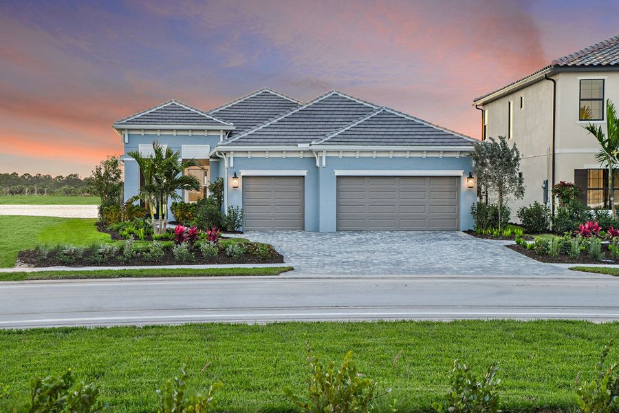 Representative exterior photo of a completed home built from the Bright Meadow 2 by Neal Communities in SkySail, Naples, FL (Image 2).