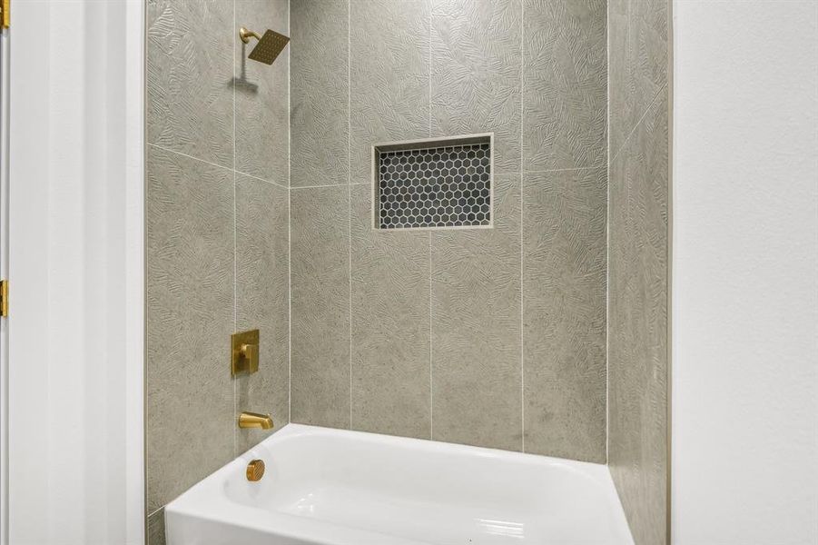 Full bath featuring shower / bathtub combination Full bath featuring shower / bathtub combination